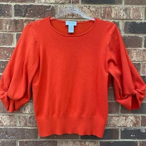 Carmen by Carmen Marc Valvo orange 3/4 length ballon sleeve sweater, size M.